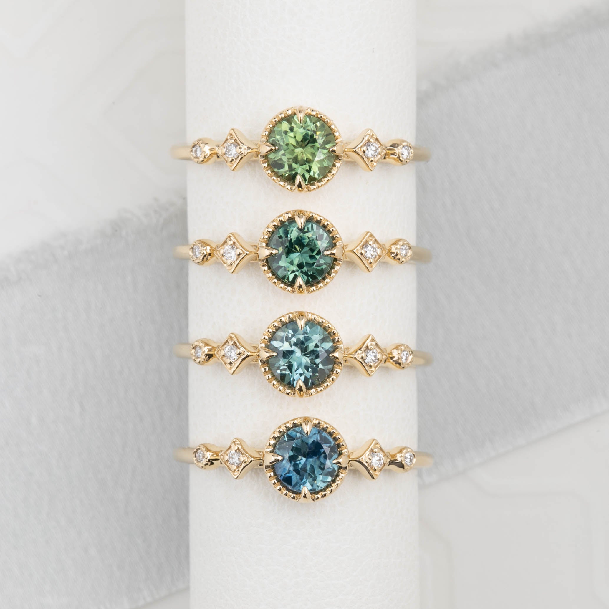 ステラリング ・0.60ct・加熱モンタナ産ブルーグリーンサファイア・K14YG