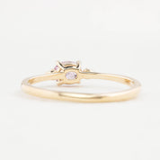 Back view of Emilie Ring featuring a 0.45ct East-West unheated Umba sapphire in 14k yellow gold.