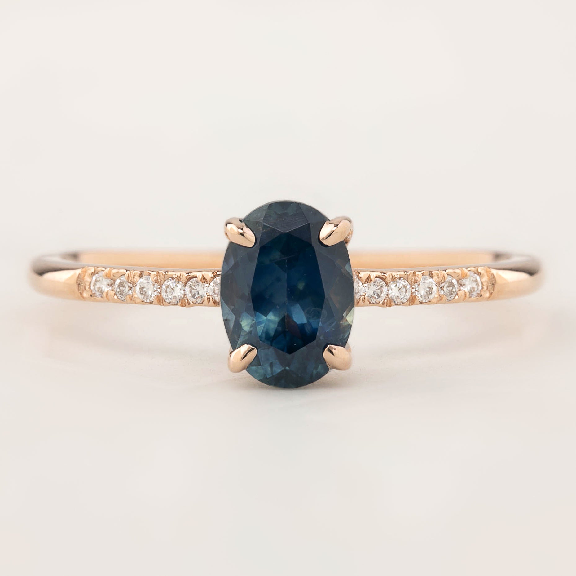 Audrey Ring with 1.15ct teal blue Montana sapphire and diamonds in 14k rose gold, handmade and ethically sourced.