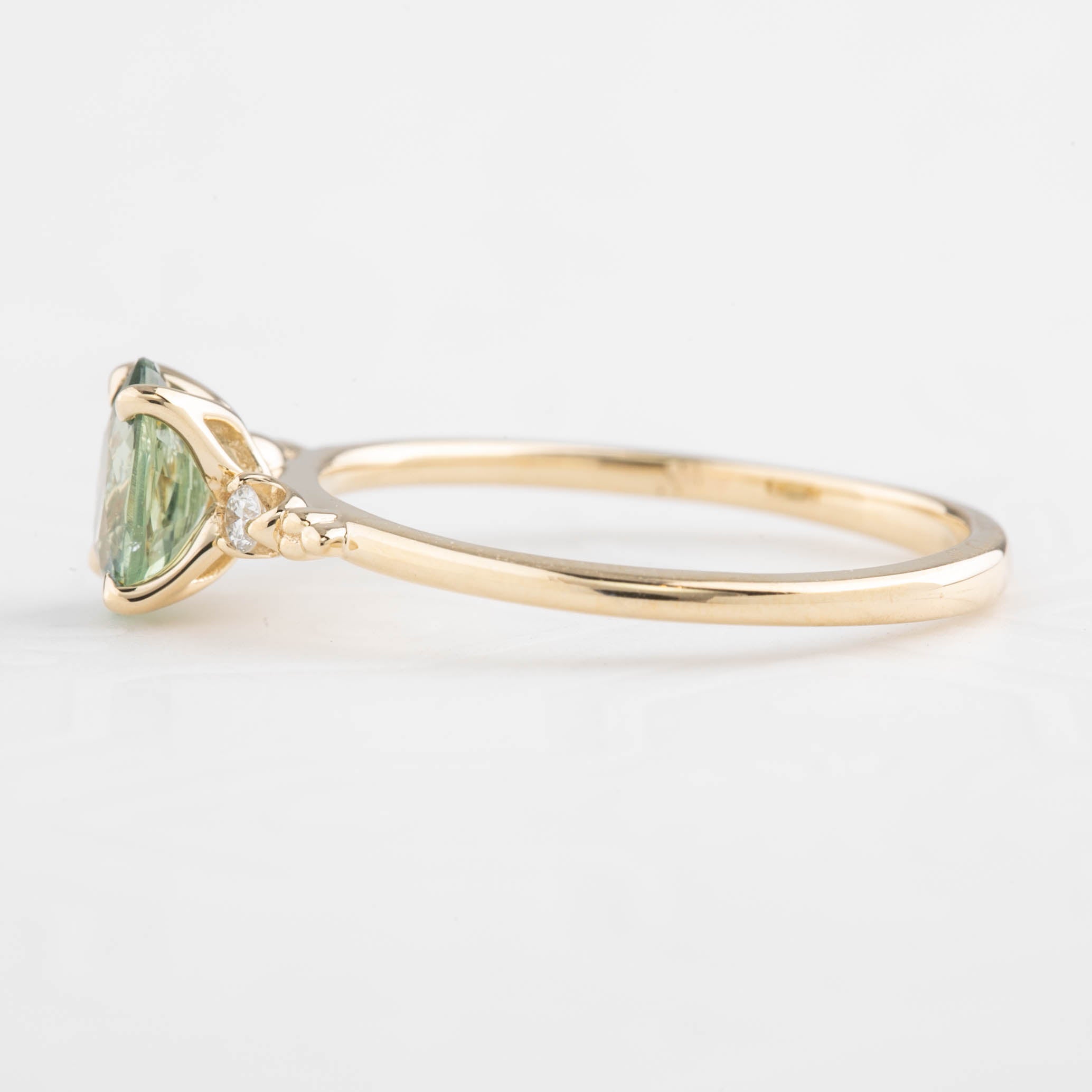 Estel Ring 0.9ct Light Green Unheated Oval Sapphire, 14K Yellow Gold (One of a kind)