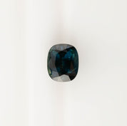 3.39ct cushion cut teal sapphire from Sri Lanka with VVS clarity and very good luster, heat treated, measuring 9.3x7.7mm