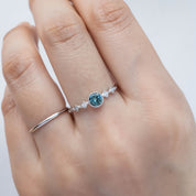 0.50ct blue Queensland Sapphire Ring in 14k white gold on finger